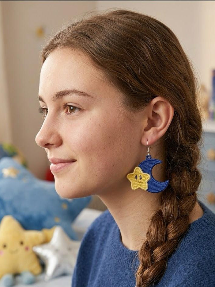 Person wearing colorful earrings in a bedroom setting